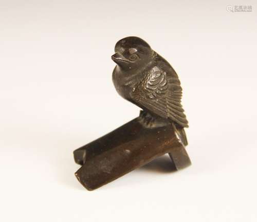 A patinated bronze model of a small garden bird, 20th centur...