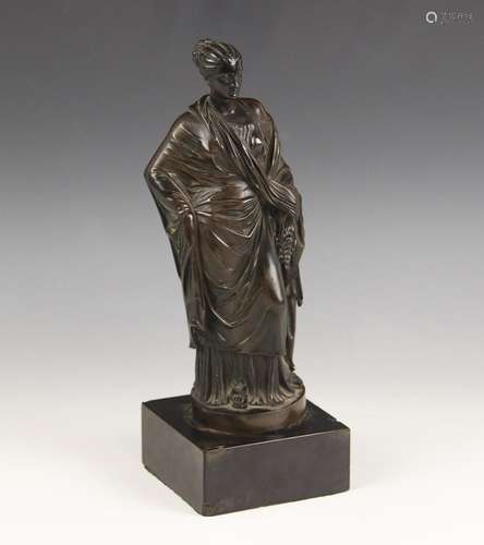 A Grand Tour patinated bronze figure of a Grecian lady in cl...