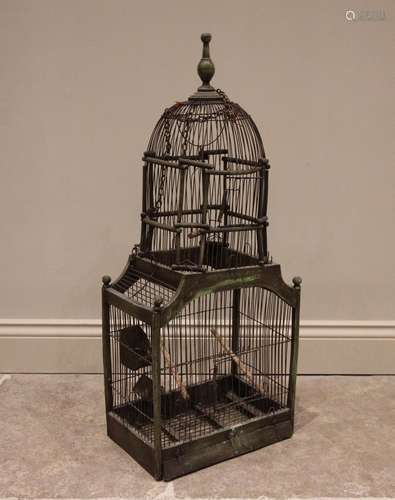 An architectural stained wood and wire work bird cage, of do...