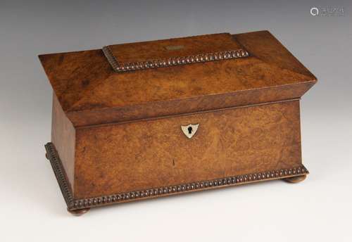 A burr walnut and rosewood sarcophagus shaped tea caddy, ear...