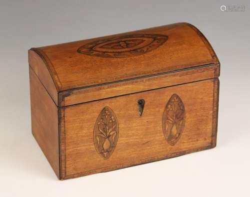 A George III mahogany domed caddy, the hinged cover centred ...