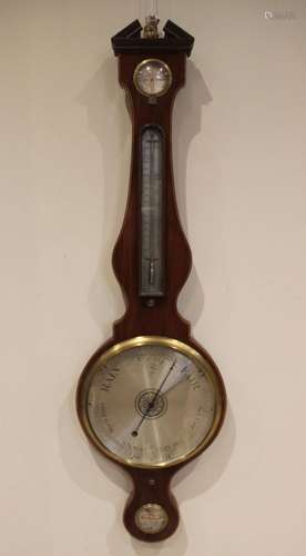 A mid 19th century mahogany wheel barometer by Hudson Optici...