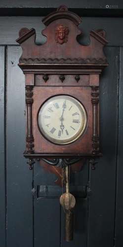 A late 19th century mahogany cased Vienna type wall clock, t...