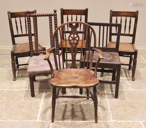 Three 18th century elm spindle back country chairs, each wit...