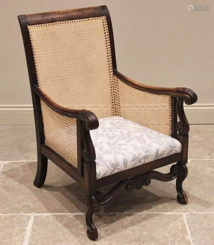 A Carolean style walnut and rattan armchair, late 19th centu...