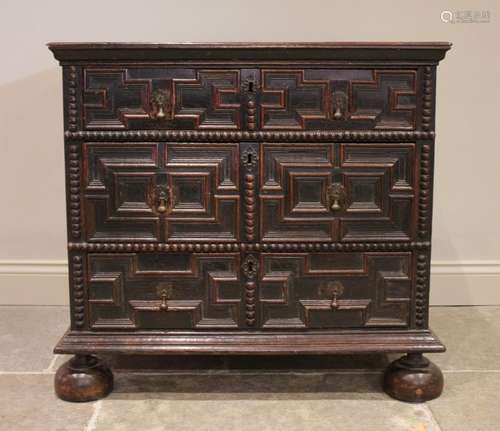 A Jacobean oak chest of drawers, late 17th century, the twin...