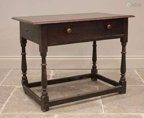 An 18th century oak side table, the rectangular moulded plan...