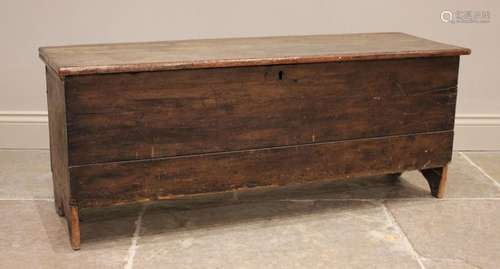 An 18th century stained pine and elm six plank coffer, the h...