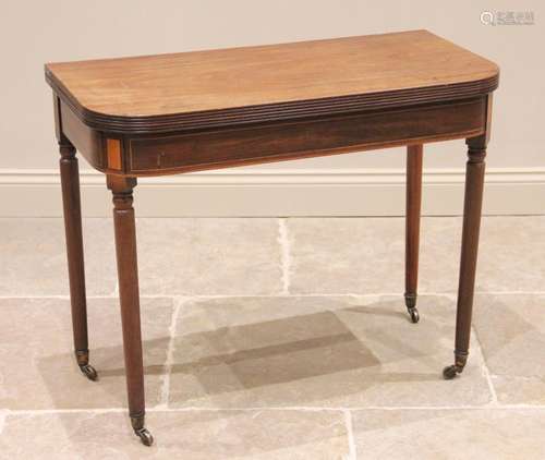 A George III mahogany tea table, the rectangular folding top...