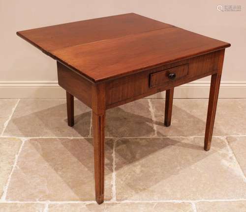 A George III mahogany tea table, the rectangular folding top...