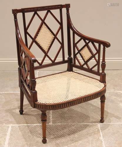 A Regency mahogany open work armchair, the lattice work back...