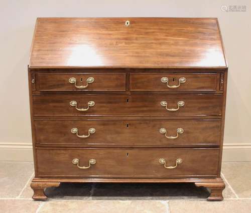 A George III mahogany bureau, the fall front above two short...