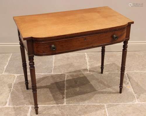 A Regency mahogany bow front side table, the shaped top abov...