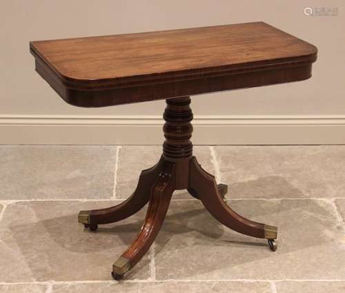 A George IV mahogany pedestal tea table, the hinged and roun...