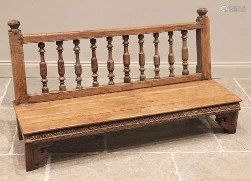 An Anglo-Indian hardwood bench, the balustrade spindled back...