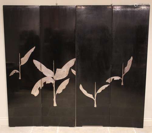 A pair of Japanese black lacquer room screens, early 20th ce...