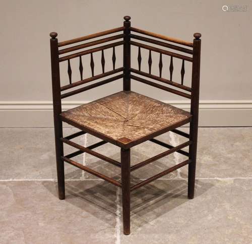 A 19th century corner chair, in the manner of Morris & C...