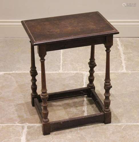 A 19th century oak joint stool, the rectangular moulded top ...