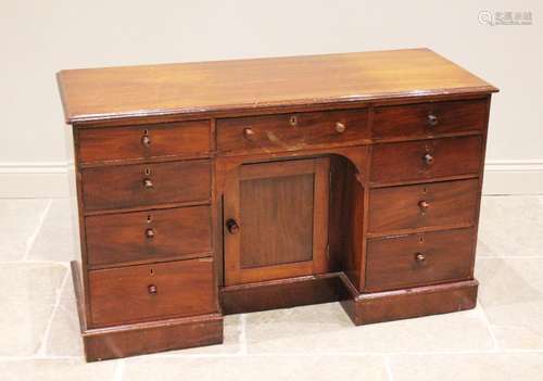 A Victorian mahogany dressing table/desk, the rectangular mo...