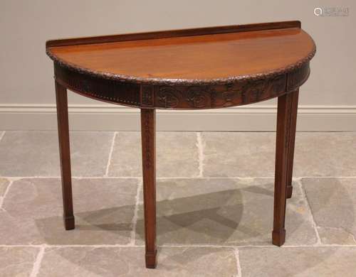 A mahogany demi lune hall table, in the Adam style, early 20...