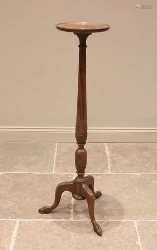 A 19th century style oak torchere, early 20th century, the c...