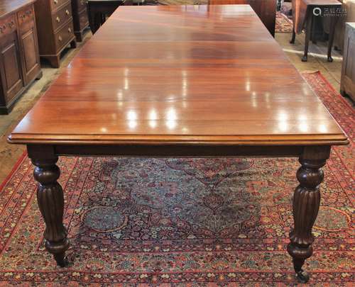 A 19th century style extending mahogany dining table, 20th c...