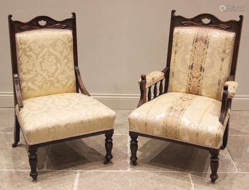 A pair of Victorian ladys and gentlemans walnut and upholste...