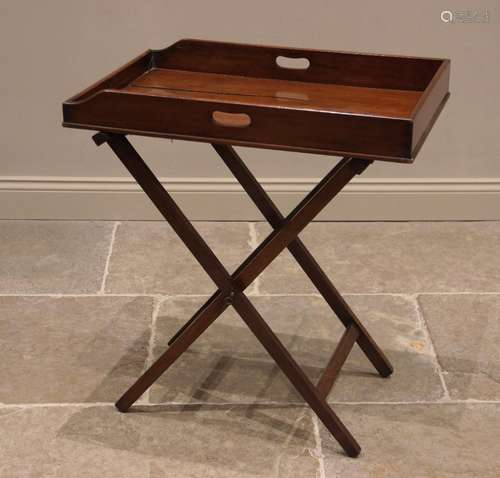 A mahogany butlers tray and associated stand, 19th century, ...