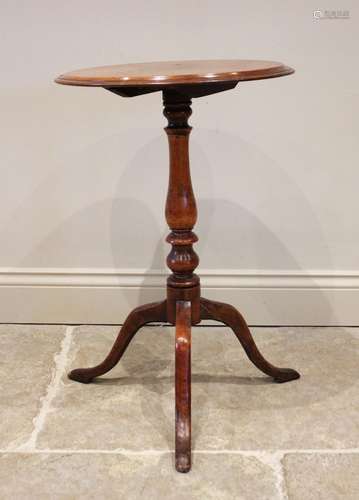 A 19th century mahogany tilt top wine table, the circular to...