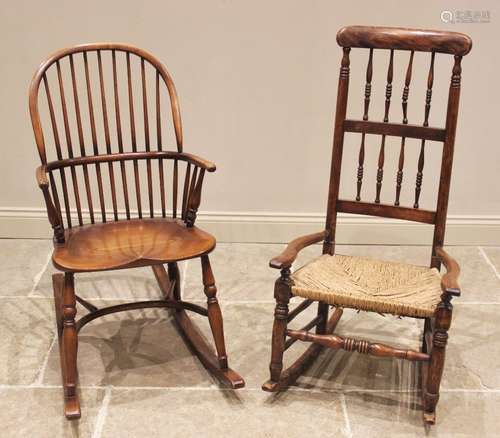 A 19th century style hoop back ash Windsor rocking chair, 20...