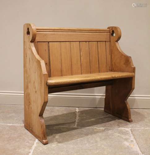 A Victorian pine pew, of cottage proportions, the panel back...