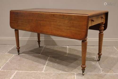 A Victorian mahogany Pembroke table, the rounded rectangular...