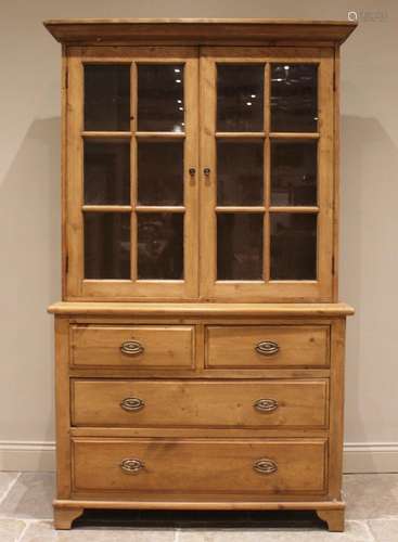 A pine kitchen dresser with glazed top, 20th century, the up...