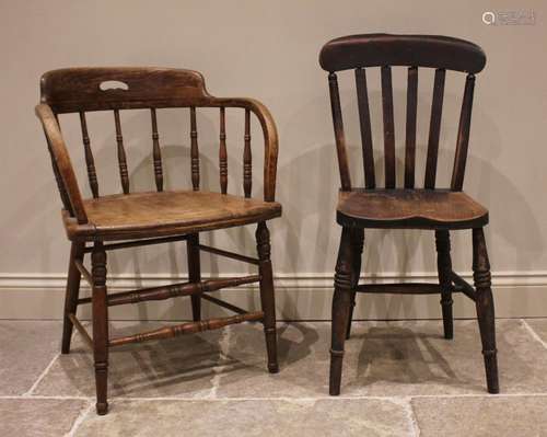 A 19th century oak and ash captains chair, with spindle back...