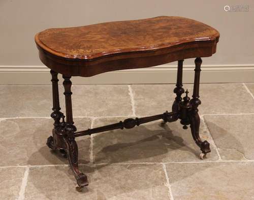 A Victorian burr walnut serpentine card table, the quarter v...