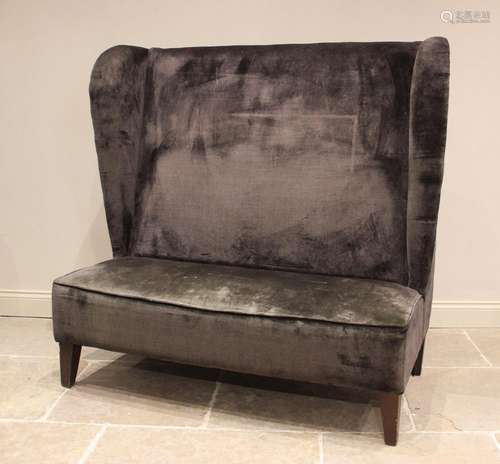 A velvet upholstered wing back porters/office settle, late 2...