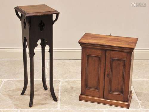 An Edwardian walnut wall cabinet, with a pair of panelled do...