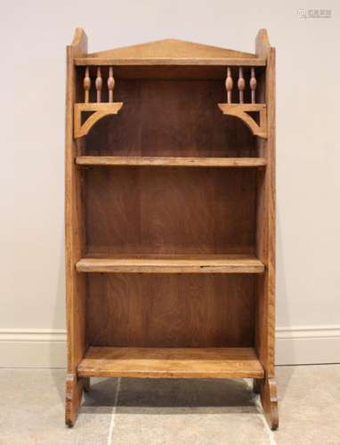 An Arts & Crafts oak bookcase, in the manner of Archibal...