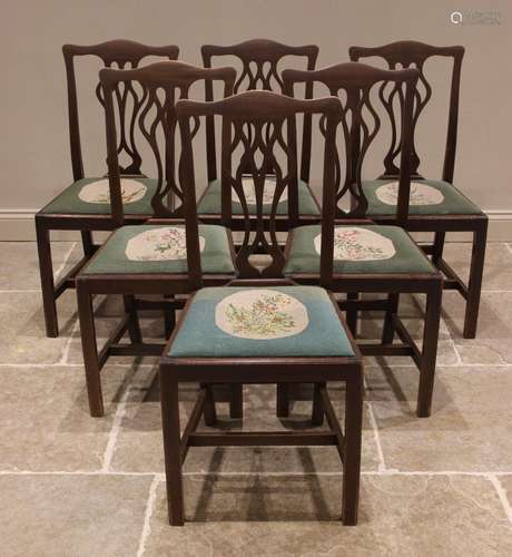 A set of six Hepplewhite style mahogany dining chairs, retai...