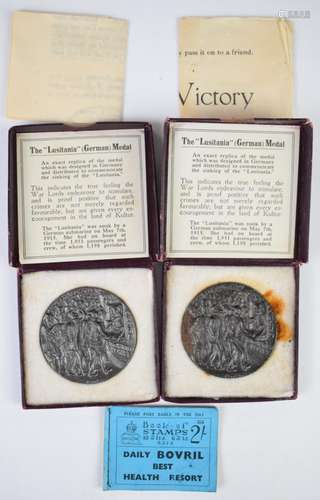 Two German WW1 interest Lusitania medals in boxes and an inc...