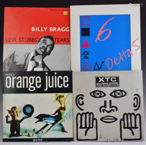 Approximately 65 twelve inch singles including The Specials,...