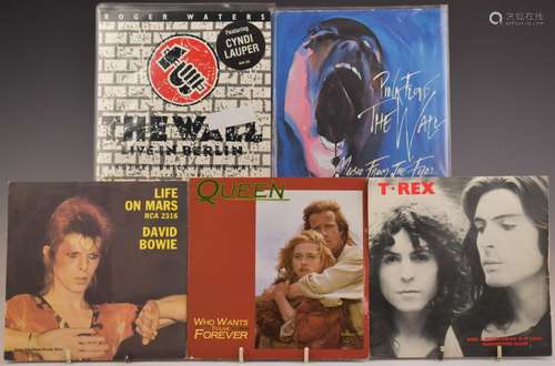 Approximately 60 singles by Queen, T-Rex, David Bowie and Pi...