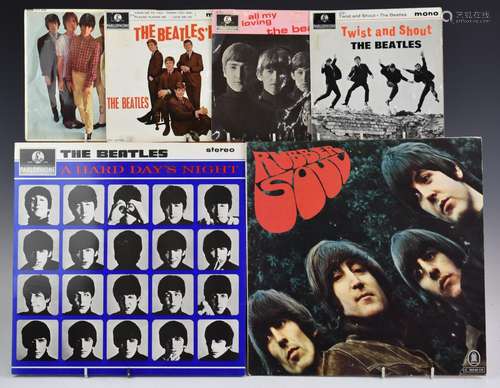 A collection of 11 albums by The Beatles and The Rolling Sto...