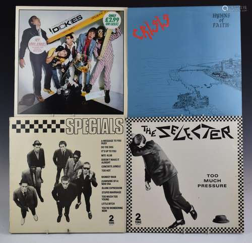 A collection of 16 albums including The Specials, Crisis, Th...