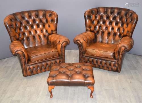 Pair of Chesterfield leather wingback armchairs and matching...