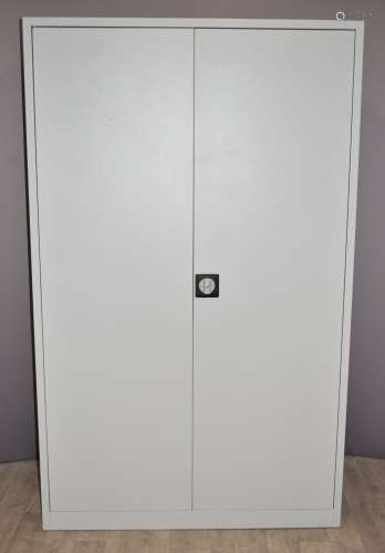 Three grey metal office storage cabinets with internal shelv...