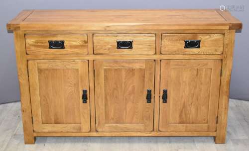 Contemporary solid oak sideboard with three drawers and cupb...