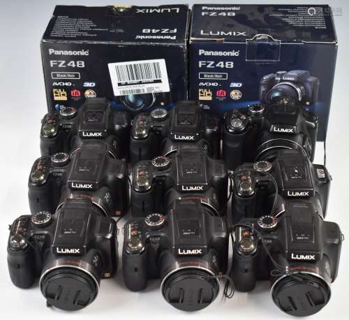 Eight Lumix FZ48 digital cameras together with eight charger...