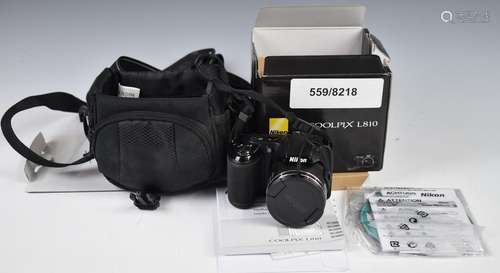 Nikon Coolpix L810 digital camera, in original box with lead...