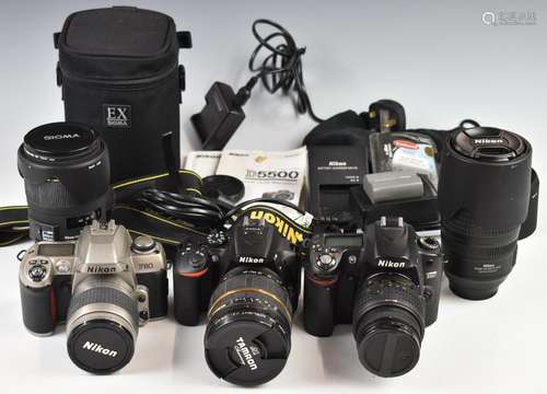 Three Nikon Digital and 35mm SLR cameras comprising D5500 wi...